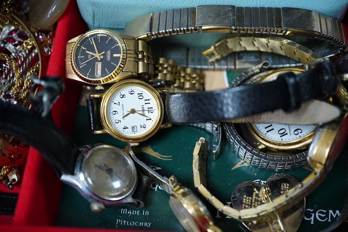 A jewellery box and contents to include a 935 white metal and paste set swallow brooch, silver locket on chain, white metal and costume jewellery, agate necklace and wrist watches including Seiko, Lanco, Lorus and Rotary